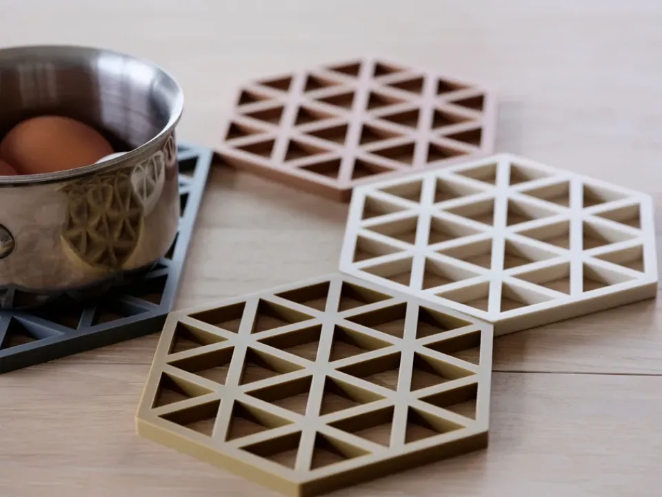 Zone Denmark Triangle trivet, Light Terracotta Red Hot